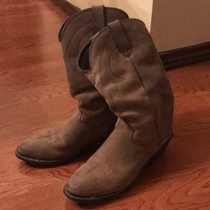Broken-in women’s leather cowboy boots